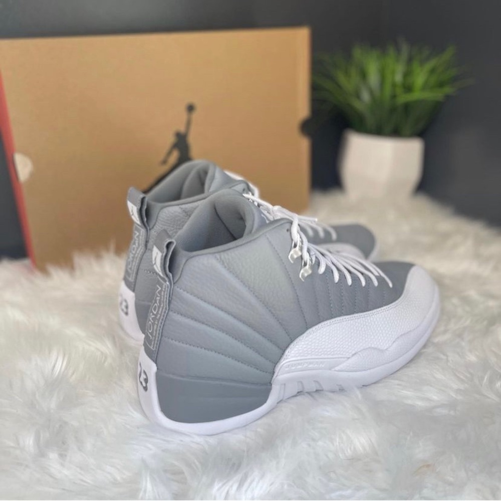 Size 11 in men, stealth air jordan 12, new in box